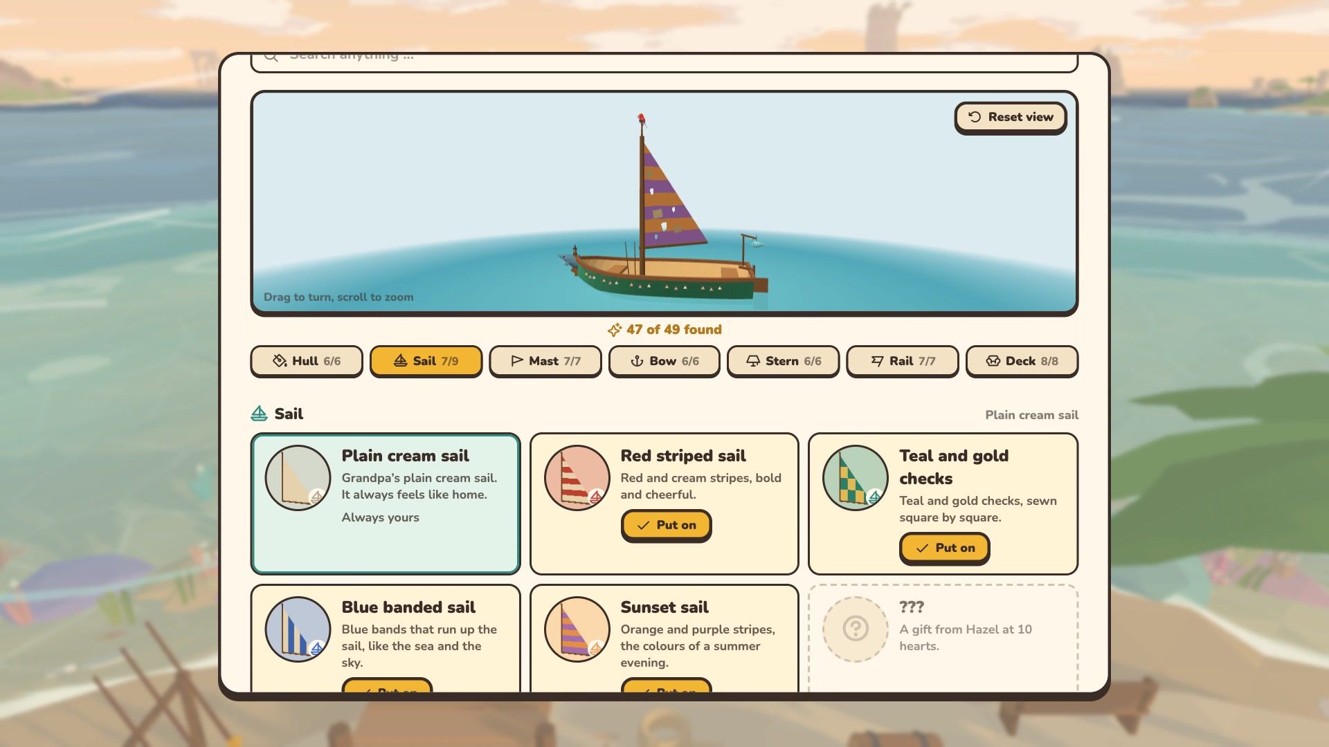 The boat dressing screen with a striped purple and gold sail and a list of sails to try.