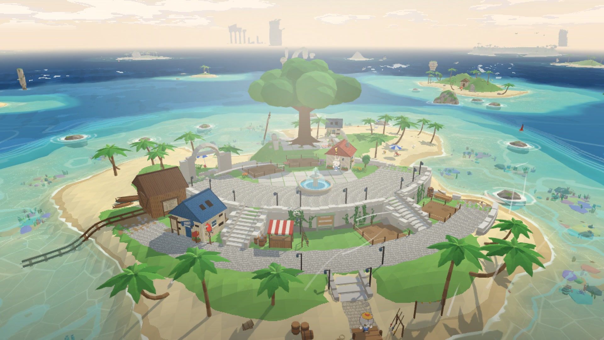 Home Cove from above: a small island village with a fountain, a big tree and palm trees in a turquoise sea.